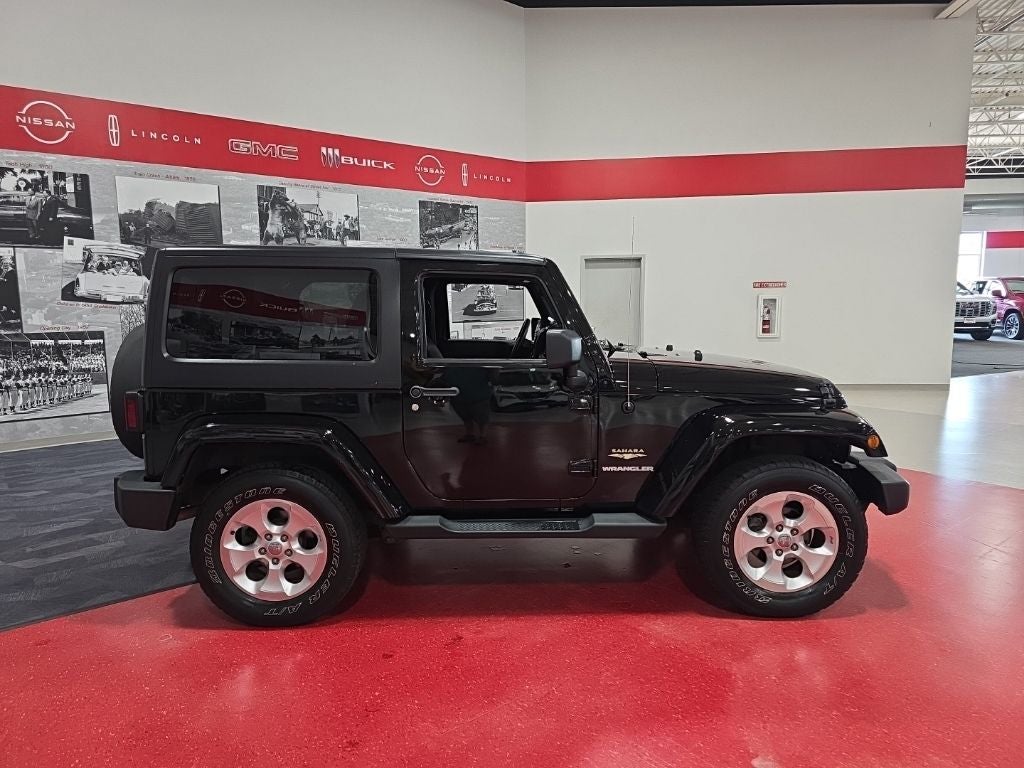 Used 2013 Jeep Wrangler Sahara with VIN 1C4GJWBG5DL562098 for sale in St. Cloud, Minnesota