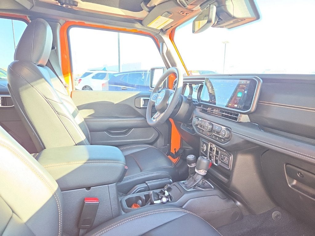 Used 2025 Jeep Wrangler 4-Door Sahara with VIN 1C4PJXEG5SW593753 for sale in St. Cloud, Minnesota
