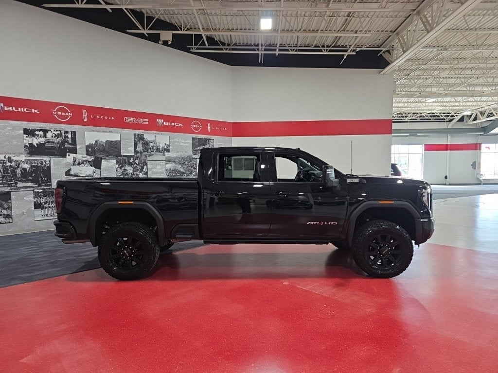 Used 2024 GMC Sierra 3500HD AT4 with VIN 1GT49VE73RF273020 for sale in St. Cloud, Minnesota