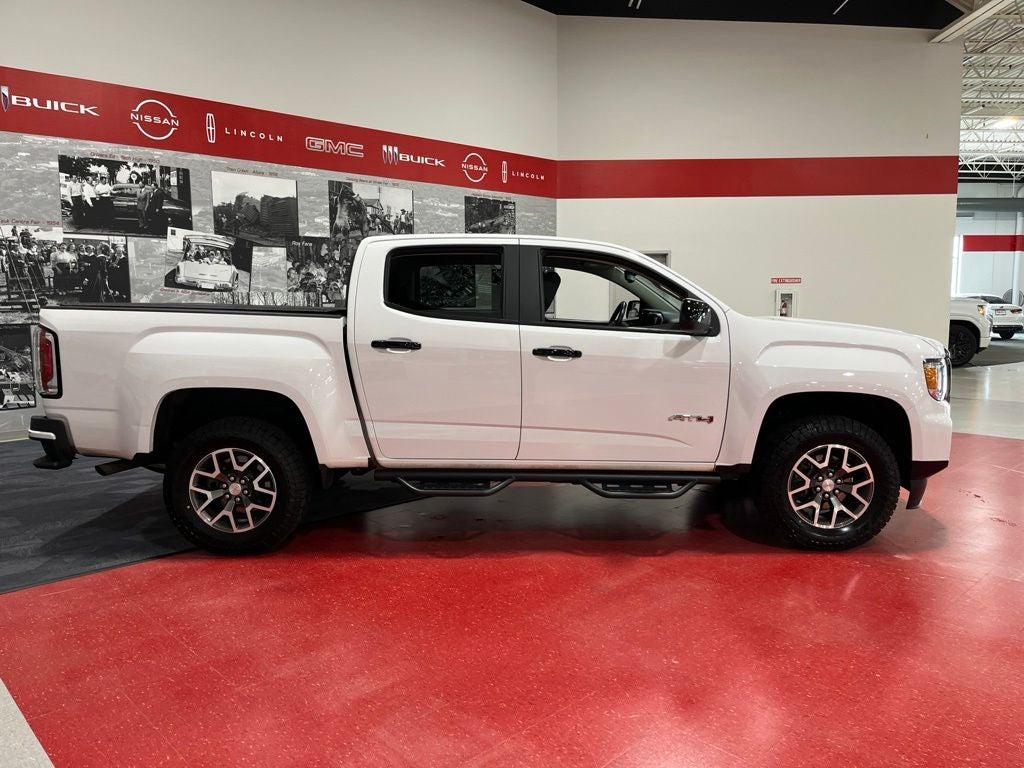 Certified 2021 GMC Canyon AT4 with VIN 1GTG6FEN4M1179034 for sale in St. Cloud, Minnesota