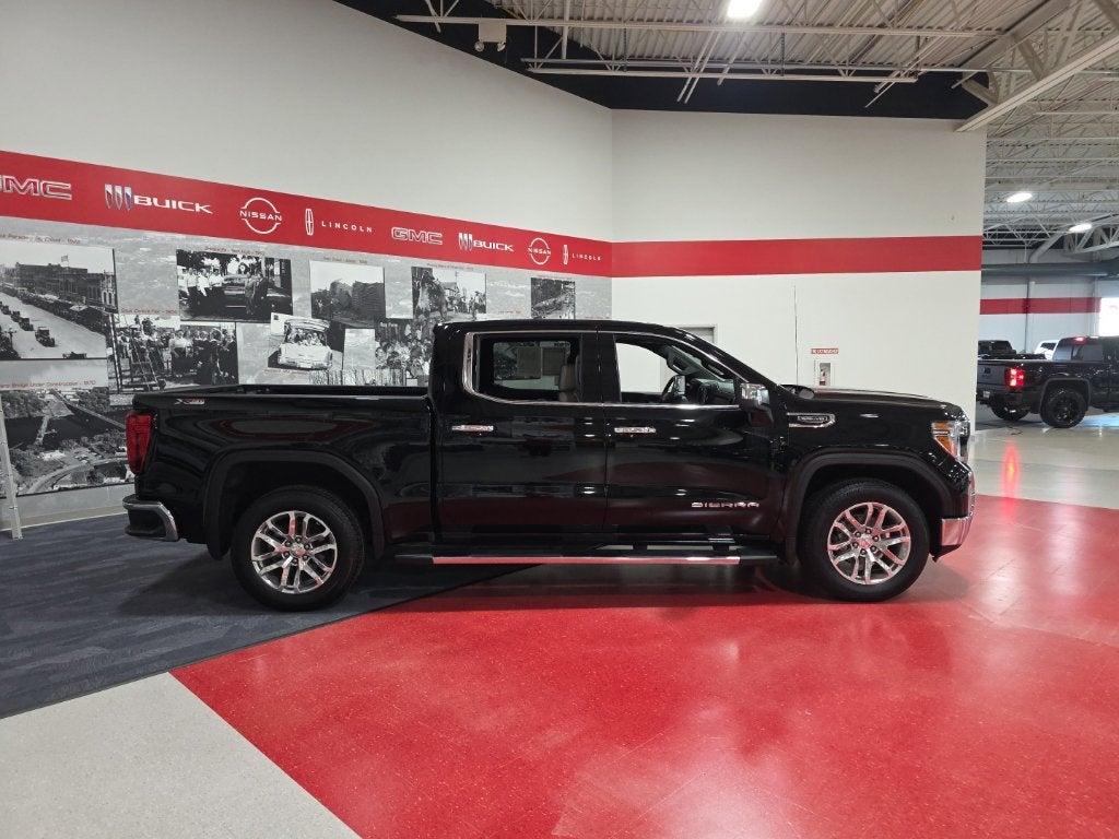 Used 2021 GMC Sierra 1500 SLT with VIN 3GTU9DED8MG196149 for sale in St. Cloud, Minnesota