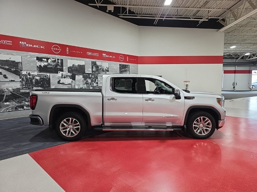 Used 2020 GMC Sierra 1500 SLT with VIN 3GTU9DELXLG357977 for sale in St. Cloud, Minnesota