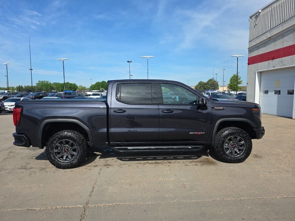 Used 2024 GMC Sierra 1500 AT4X with VIN 3GTUUFELXRG214708 for sale in St. Cloud, Minnesota
