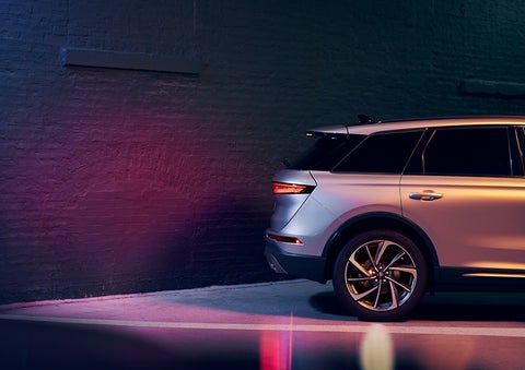 A 2023 Lincoln Corsair® SUV is shown backing up toward a wall. | Miller Lincoln in Saint Cloud MN
