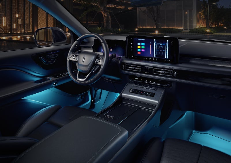 Deep blue ambient lighting glows from various places within a 2026 Lincoln Aviator® SUV. | Miller Lincoln in Saint Cloud MN