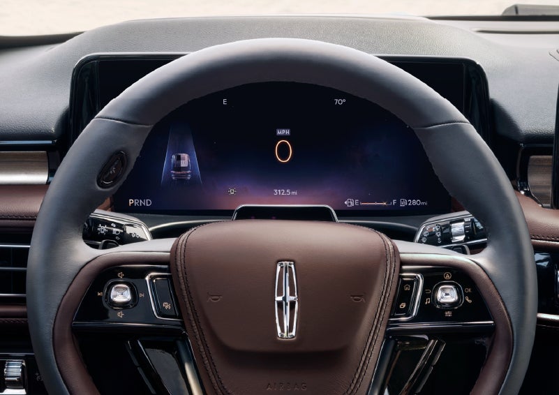 The driver’s information cluster display behind the steering wheel is shown. | Miller Lincoln in Saint Cloud MN