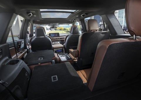 One side of the PowerFold® third-row seat and a second-row seat are folded forward in the 2026 Lincoln Aviator® SUV. | Miller Lincoln in Saint Cloud MN