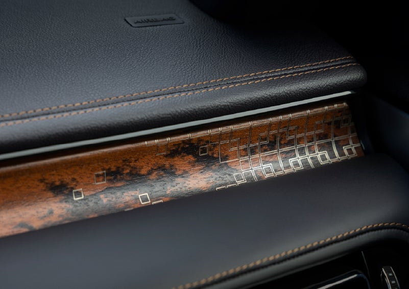 A close-up shot of the 2026 Lincoln Aviator® dashboard with unique black and brown accents and brown stitching. | Miller Lincoln in Saint Cloud MN