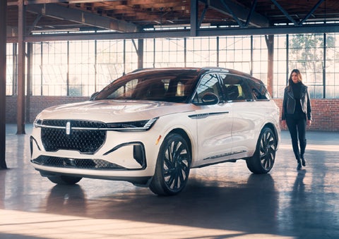 A person approaches a 2026 Lincoln Nautilus® SUV. | Miller Lincoln in Saint Cloud MN