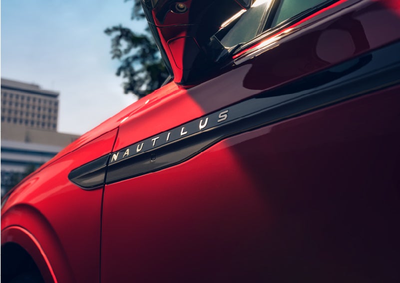 A side badge on the passenger door reads Nautilus. | Miller Lincoln in Saint Cloud MN