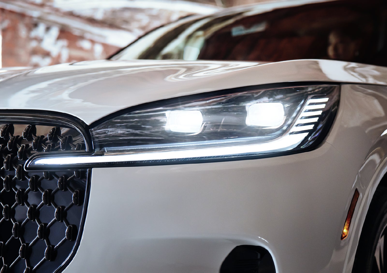 A close-up of a headlamp on the 2027 Lincoln Aviator® SUV is shown. | Miller Lincoln in Saint Cloud MN