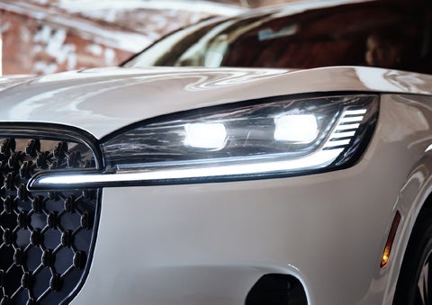 A close-up of a headlamp on the 2027 Lincoln Aviator® SUV is shown. | Miller Lincoln in Saint Cloud MN