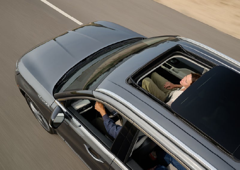 The available panoramic Vista Roof® of a 2027 Lincoln Aviator® SUV is open. | Miller Lincoln in Saint Cloud MN