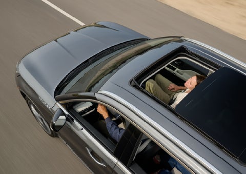 The available panoramic Vista Roof® of a 2027 Lincoln Aviator® SUV is open. | Miller Lincoln in Saint Cloud MN